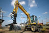Dvoucestné rypadlo New Holland MH Plus S firmy Chládek a Tintěra Havlíčkův Brod s drapákem