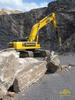 Pásové rypadlo Komatsu PC450LC-8 firmy Outulný s kladivem Atlas Copco