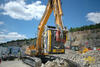 Pásové rypadlo Liebherr R 906 s drticí lžící MB BF 90.3