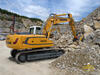 Pásové rypadlo Liebherr R 906 s drticí lžící MB BF 90.3