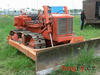 Pásový traktor Allis-Chalmers HD 5 s dozerovou radlicí Baker