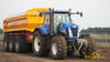 Kolový traktor New Holland T8030 s demprem Veenhuis