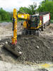Kolové rypadlo JCB JS145 s hydraulicky polohovací platýrkou