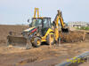 Rypadlonakladač Caterpillar 428E firmy RM Gas