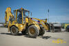 Rypadlonakladač Komatsu WB 70A firmy Eurovia CS