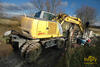 Kolové rypadlo New Holland MH City firmy Ing. Radek Pospíšil