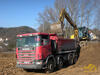 Kolové rypadlo Caterpillar M316C firmy Ladislav Podsedník nakládá vozidlo Scania 124c 420 téže firmy