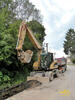 Kolové rypadlo Caterpillar M313C firmy SAD-PaP