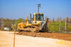 Pásový dozer Komatsu D65 EX firmy Strabag