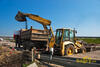 Rypadlonakladač Komatsu WB 93R firmy Silnice doprava