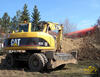 Kolové rypadlo Caterpillar M313C firmy Petr Prudký