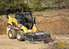 Smykem řízený nakladač Caterpillar 262C Two Speed firmy Petr Prudký se zametačem BP15B