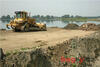 Dozer Caterpillar D5H XL připravuje novou pláž