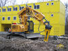 Pásové rypadlo Liebherr R 924 Compact Tunnel s kladivem Atlas Copco MB 1700 firmy OHL ŽS