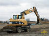 Kolové rypadlo Caterpillar M315C firmy Jema Svitavy