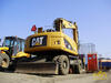 Kolové rypadlo Caterpillar M313D