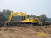 Pásová rypadla Komatsu PC 290 LC a Caterpillar 325B LME firmy Rekultivační výstavba Most