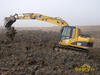 Pásové rypadlo Caterpillar 312C pracující pro Vodohospodářské stavby