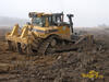 Pásový dozer Caterpillar D8R pracující pro Vodohospodářské stavby