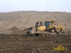 Pásový dozer Caterpillar D8R pracující pro Vodohospodářské stavby