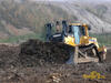 Pásový dozer Caterpillar D8R pracující pro Vodohospodářské stavby