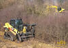 Pásový smykem řízený Caterpillar 277C High Flow XPS s mulčovací frézou Caterpillar HM312