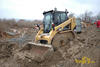 Smykem řízený nakladač Caterpillar 246B po defektu