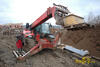 Teleskopický manipulátor Manitou MT 1740 SL Turbo - oprava defektu
