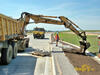Kolové rypadlo Komatsu PW170 firmy Skanska DS