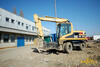 Kolové rypadlo Caterpillar M 312 firmy Zempram I & J