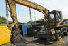 Kolové rypadlo Caterpillar M 315 firmy Elpro Moravia