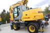 Kolové rypadlo New Holland MH Plus