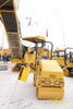 Pásová silniční fréza Caterpillar PM-102 a tandemový válec CB14