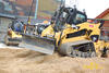 Pásový smykem řízený nakladač Caterpillar 297C High Flow XPS Two Speed s radlicí a nivelací