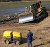 Příkopový válec Wacker RT a dozer Caterpillar D6R XW Series II