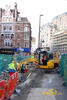 Minirypadlo JCB 8025 firmy O'Conell Plant Group na St. Giles High St
