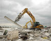 Caterpillar 325D s Komatsu PC 160 LC v pozadí