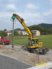 Dvoucestné rypadlo Liebherr A 900 C ZW Litronic firmy Subterra s vrtacím zařízením ABI