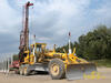 Grejdr Baukema SHM 5-200 firmy Subterra s nivelací Leica GradeSmart