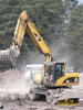 Kolové rypadlo Caterpillar M 318C firmy Szarzec