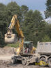 Kolové rypadlo Caterpillar M 318C firmy Szarzec