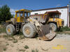Kolový nakladač KNB 250 a dumper Belaz 7548