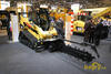 Pásový smykem řízený nakladač Caterpillar 297C High Flow XPS Two Speed s rýhovačem T15B