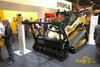 Pásový smykem řízený nakladač Caterpillar 299C High Flow XPS Two Speed s lesní frézou HM315