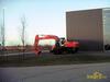 Kolové rypadlo Zaxis 210W před budouvou Hitachi