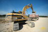 Pásové rypadlo Caterpillar 322B LN firmy Skanska DS