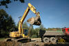 Pásové rypadlo Komatsu PC240 LC firmy PB SCOM