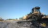Pásový dozer Caterpillar D5M XL firmy Skanska DS