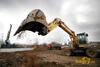 Kolové rypadlo New Holland MH City firmy ZV Servis Praha