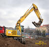 Kolové rypadlo New Holland MH City firmy ZV Servis Praha
